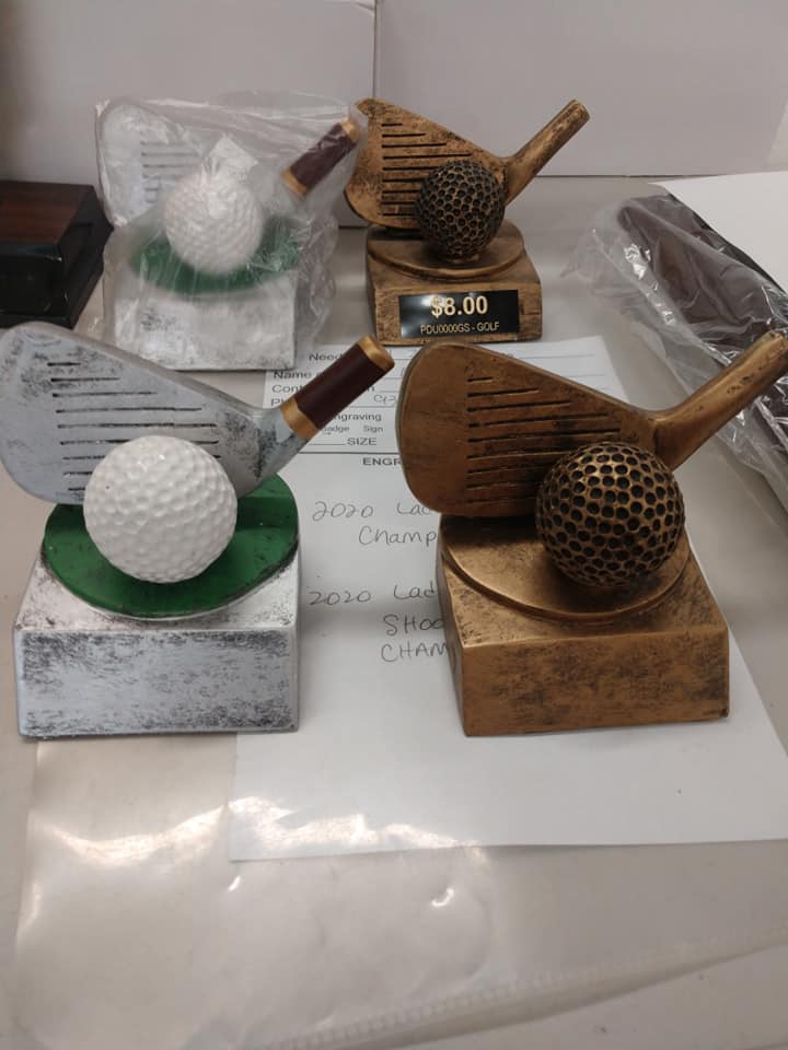 marble golf club and ball trophy